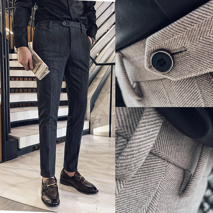 Stylish men's slim-fit gray herringbone pants, ideal for smart casual or professional business attire.