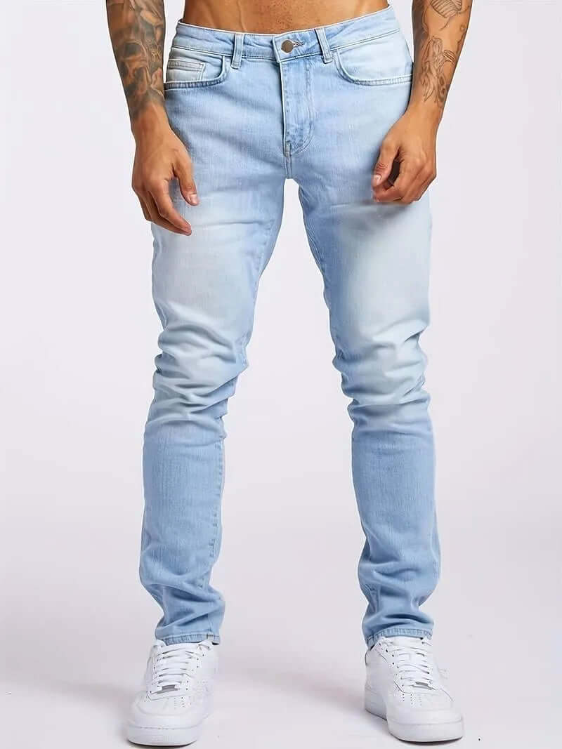 Comfortable men's slim-fit denim jeans for a modern, tailored look.