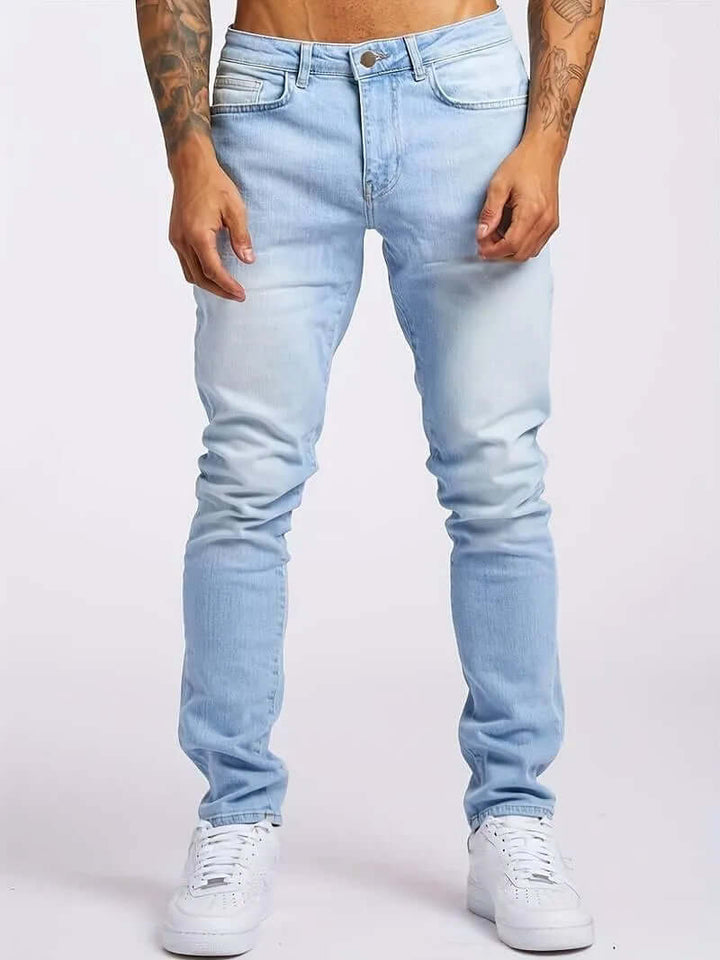 Comfortable men's slim-fit denim jeans for a modern, tailored look.