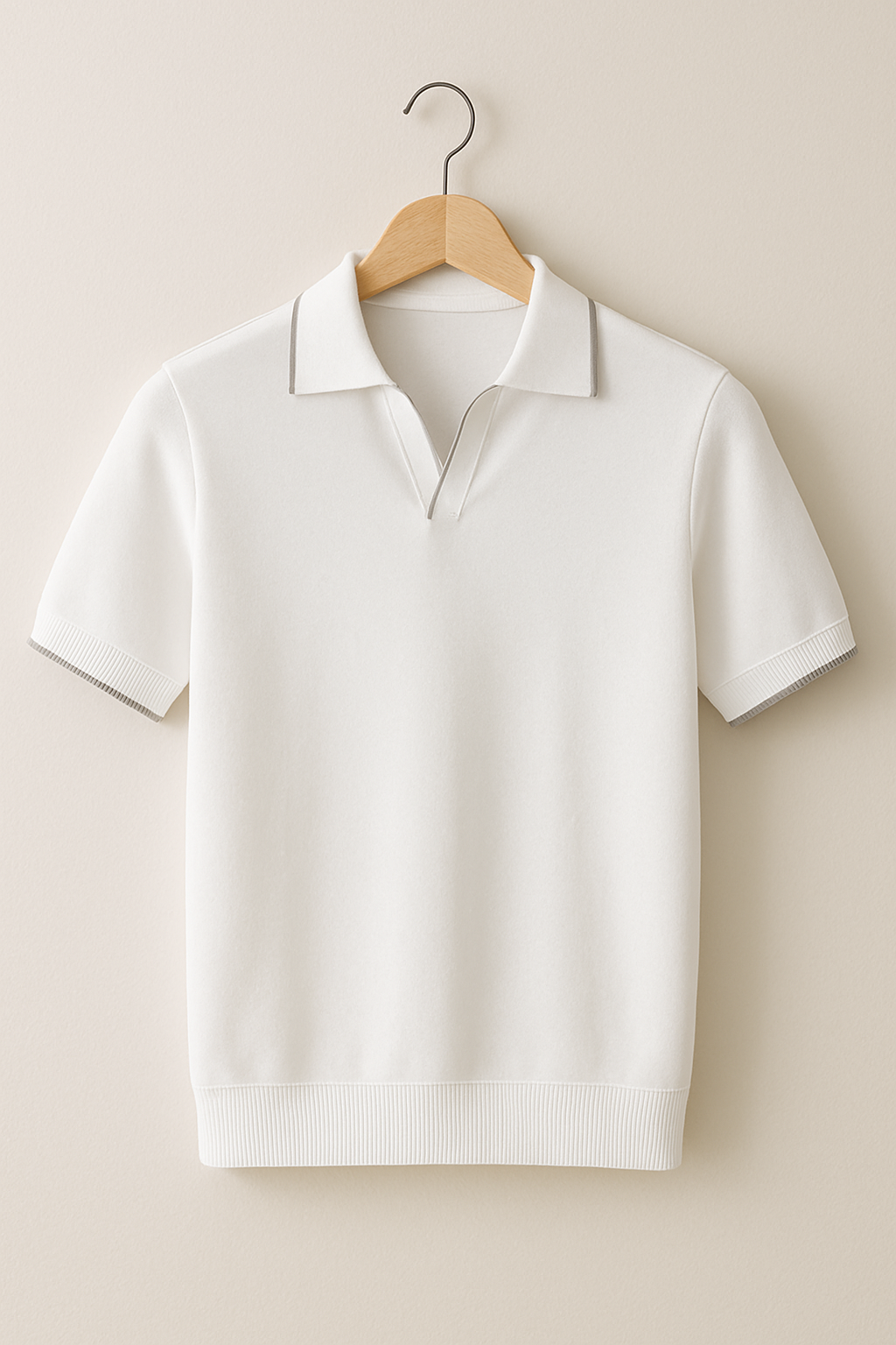 Close-up of the contrast trim on a men's slim fit short sleeve knit polo shirt.
