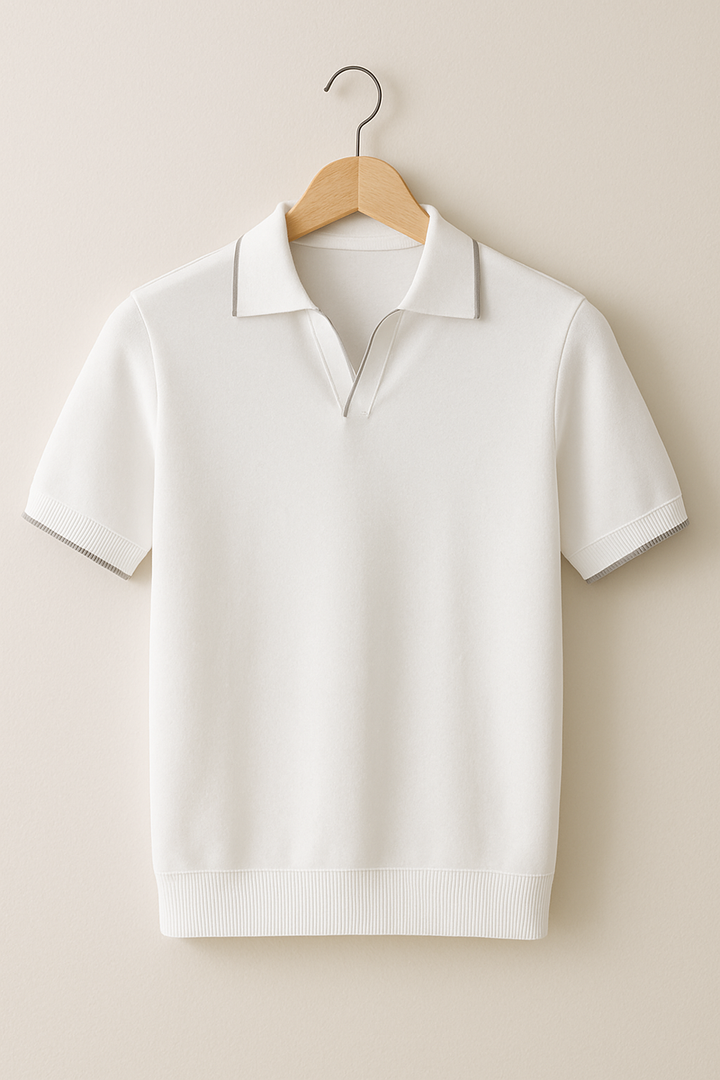Close-up of the contrast trim on a men's slim fit short sleeve knit polo shirt.