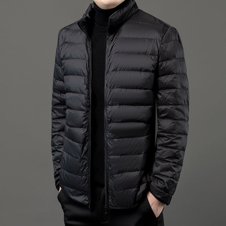 Warm & lightweight men's puffer jacket, slim-fit zip-up outerwear for cold weather.