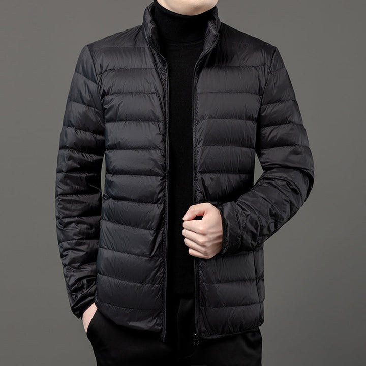 Modern casual men's slim-fit puffer jacket, ideal lightweight outerwear for fall.