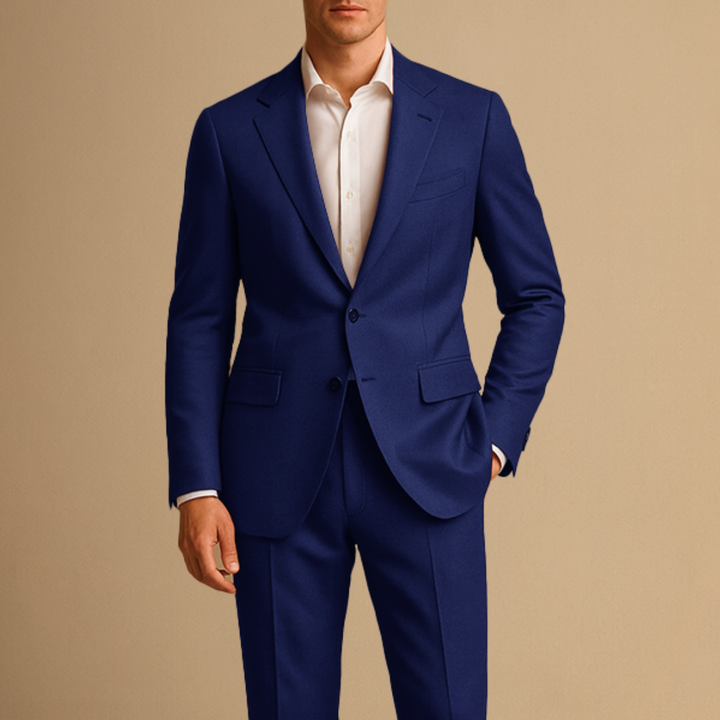 Man wearing a sleek slim fit tailored two-piece suit, ideal for modern formal wear & professional business attire.
