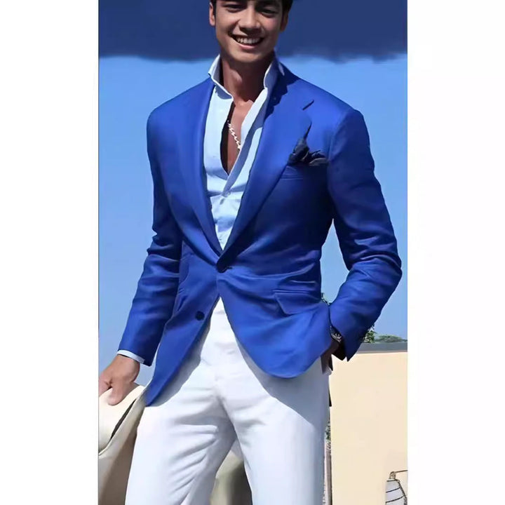 Man wearing a navy blue blazer, showcasing a smart casual look