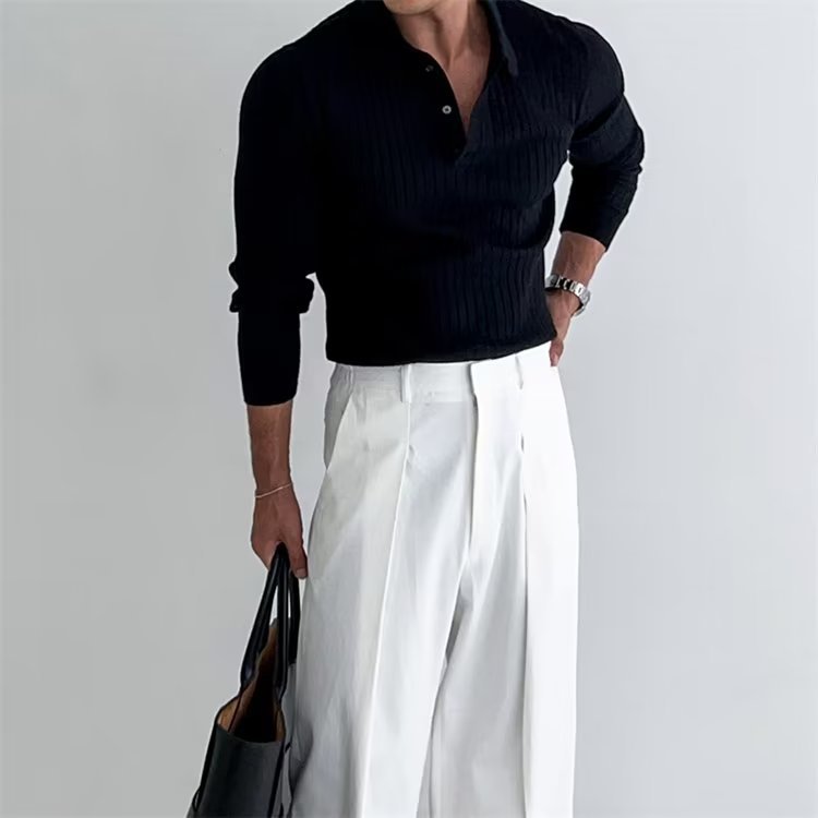 Stylish men's slim fit long sleeve polo shirt with a sophisticated ribbed texture for autumn fashion.