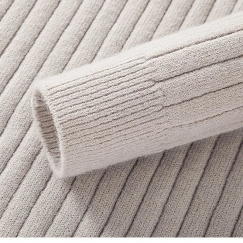 Elegant men's quarter zip sweater, slim fit, with a stand collar for a sharp, modern look.