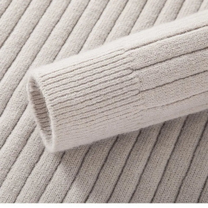 Elegant men's quarter zip sweater, slim fit, with a stand collar for a sharp, modern look.