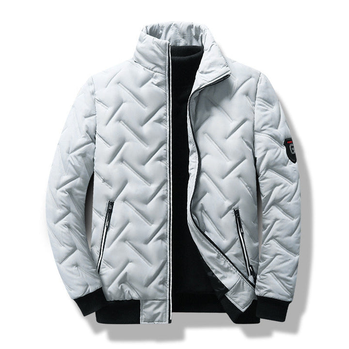 Stylish men's quilted jacket featuring a chevron pattern, stand collar, and full zipper. Modern slim fit menswear.