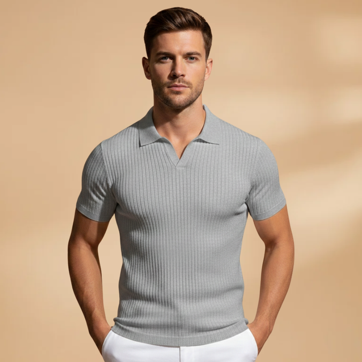 Stylish men's ribbed polo shirt with a flattering slim fit, perfect for versatile everyday wear.
