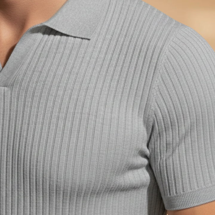 Casual yet refined men's slim fit polo, showcasing a ribbed design for a fresh, modern appearance.