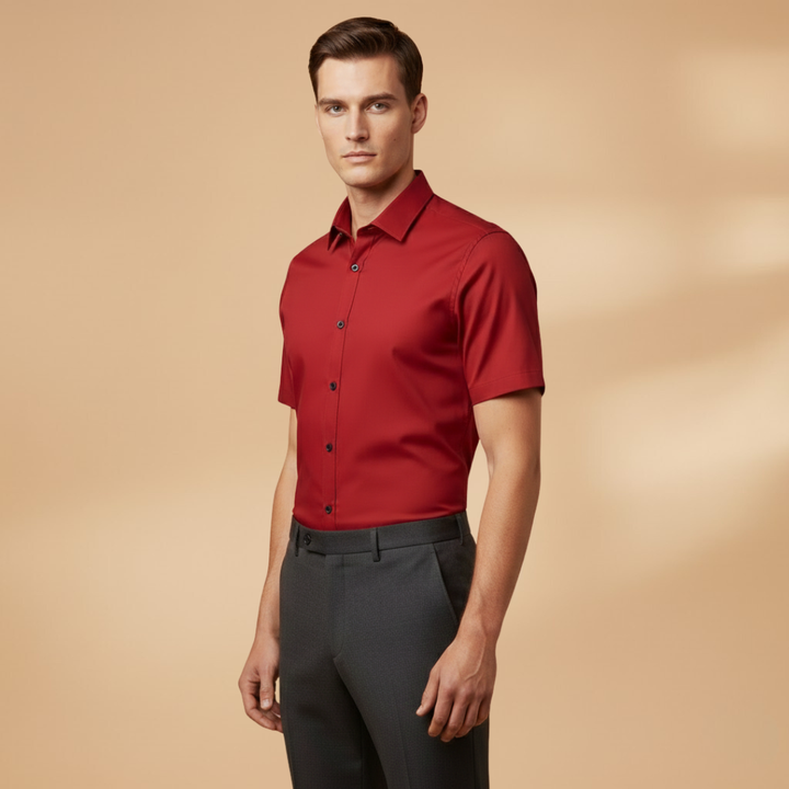 Man wearing a black slim fit short sleeve button-down shirt, perfect for smart casual events.
