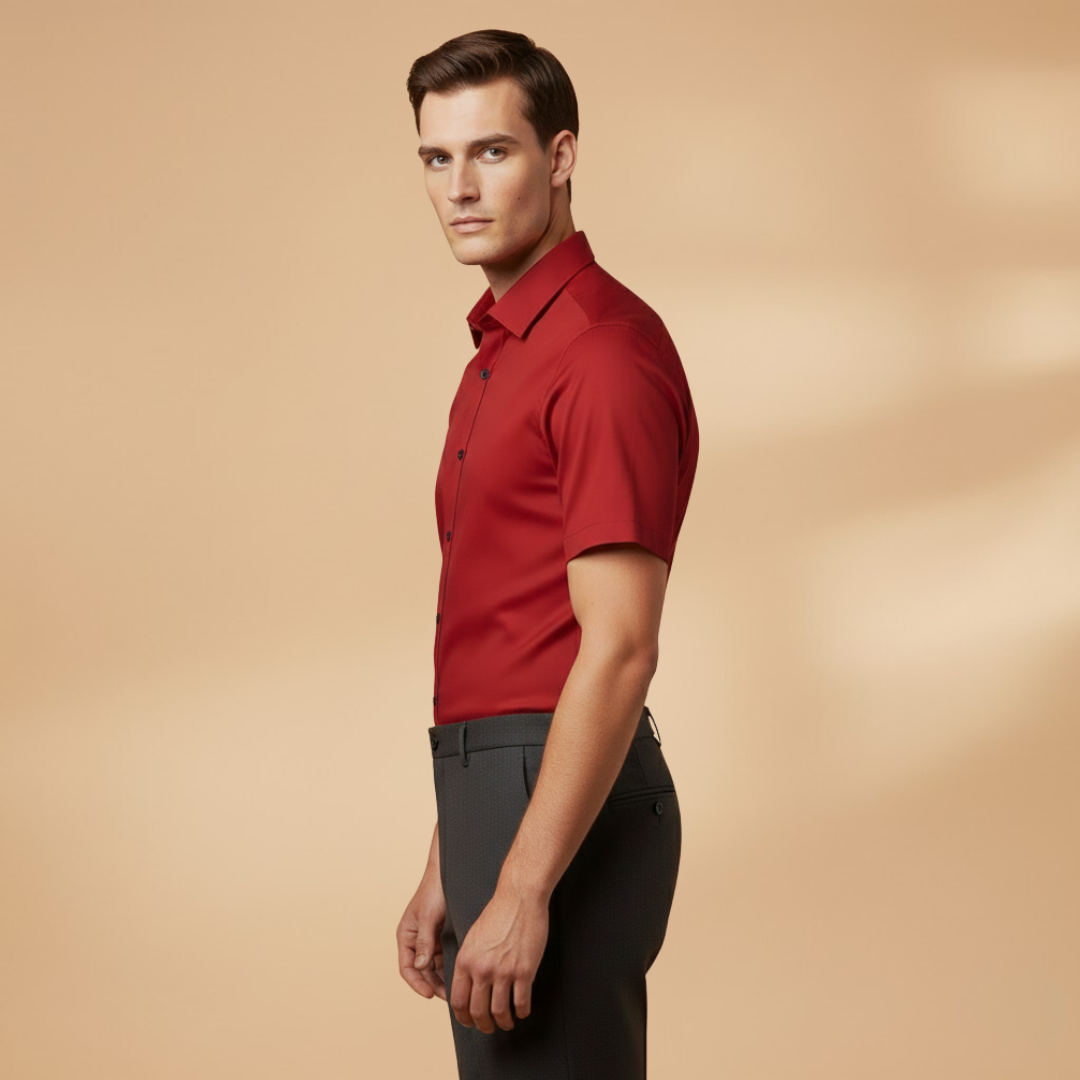Detail shot of the buttons on a men's red slim fit short sleeve button-down shirt.