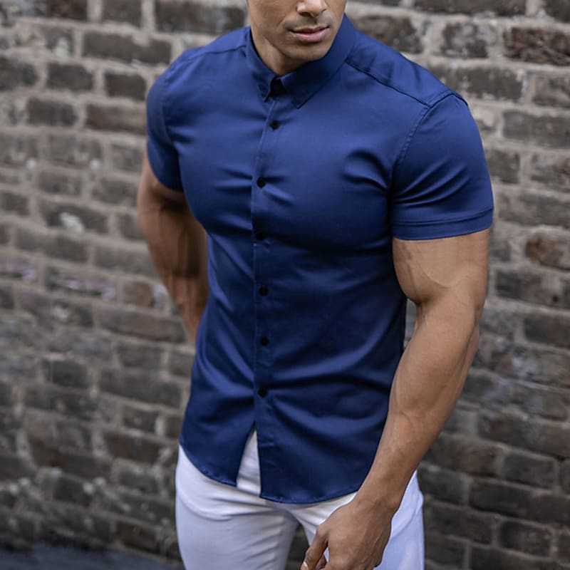 Versatile men's slim fit short sleeve shirt for modern casual or semi-formal spring/summer fashion.