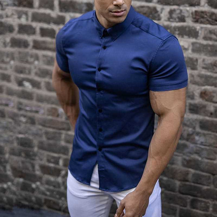 Stylish men's casual short sleeve slim fit button-up shirt, modern menswear design.