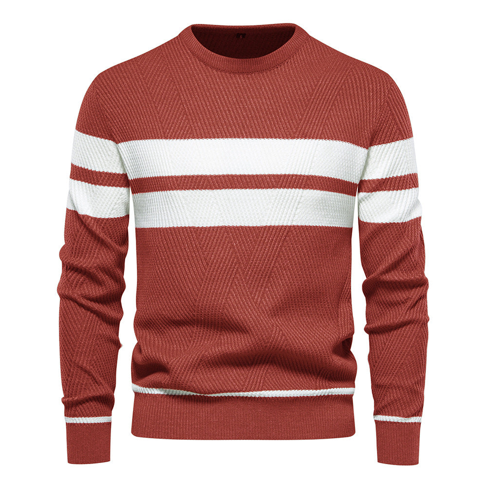 Close-up of a men's striped crew neck sweater, highlighting the slim fit and quality fabric.