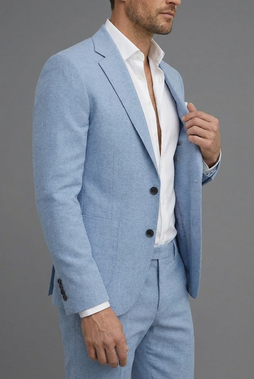Groom wearing a stylish slim fit two-piece suit, ideal for a summer wedding.