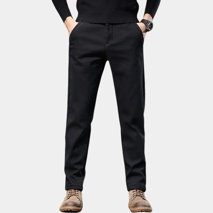 Close-up of men's slim fit stretch tapered smart trousers, highlighting the comfortable fabric and clean lines.