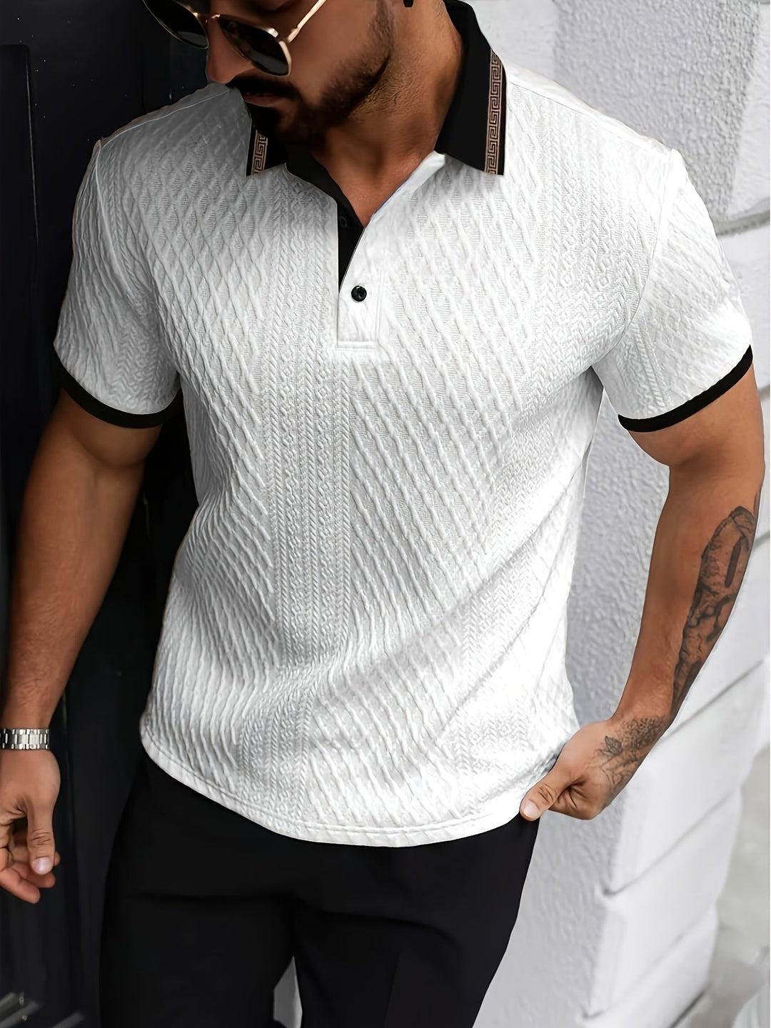 A man in a textured polo shirt, showcasing its breathable and casual summer style.