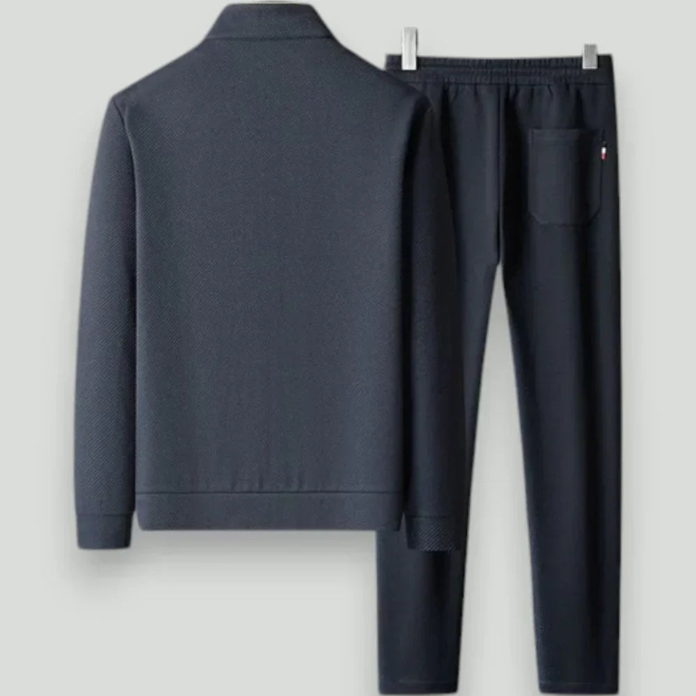 Stylish men's slim fit tracksuit. Durable activewear set for training, workouts & everyday comfort.