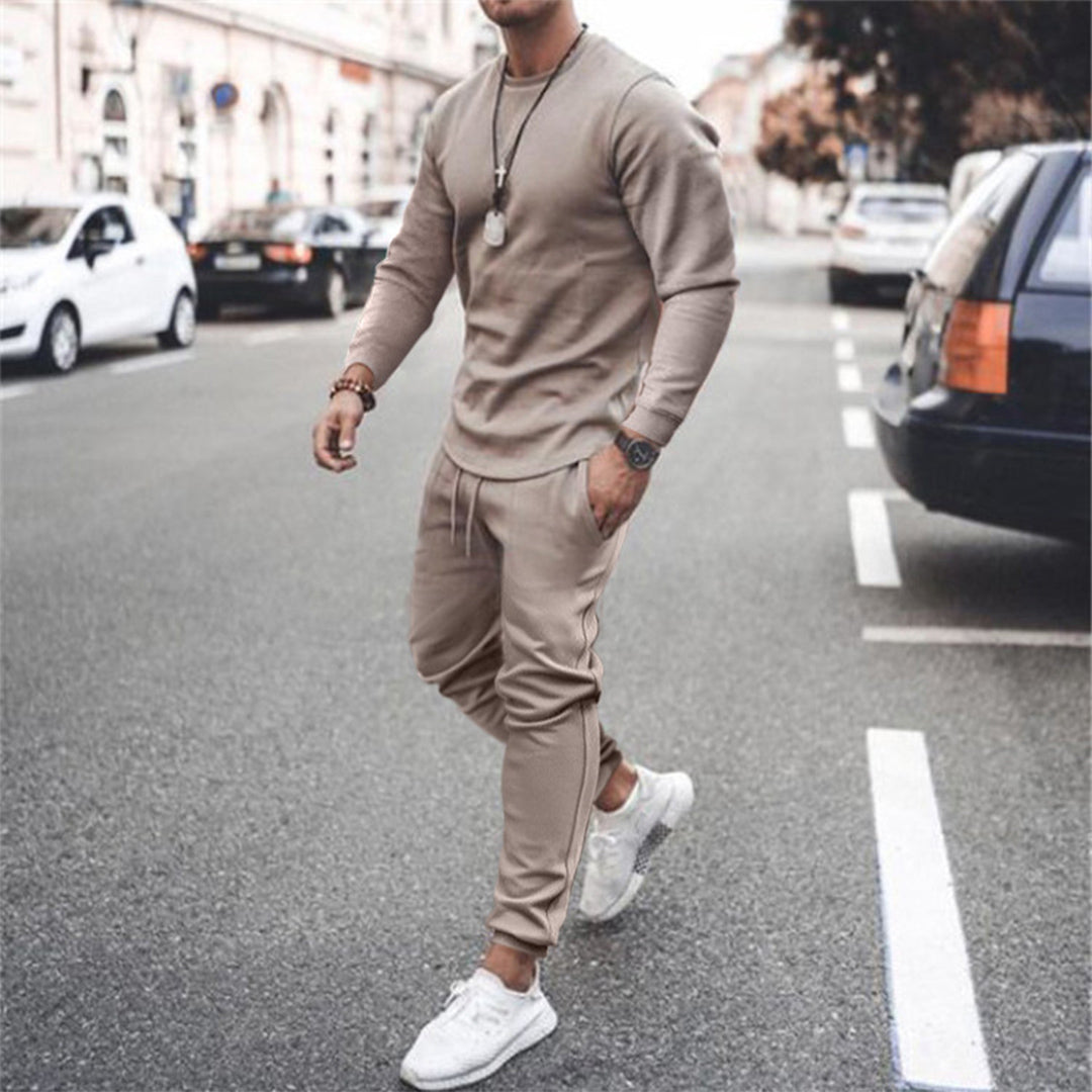 Back view of men's slim fit tracksuit, showcasing comfortable and athletic design for jogging & sportswear.
