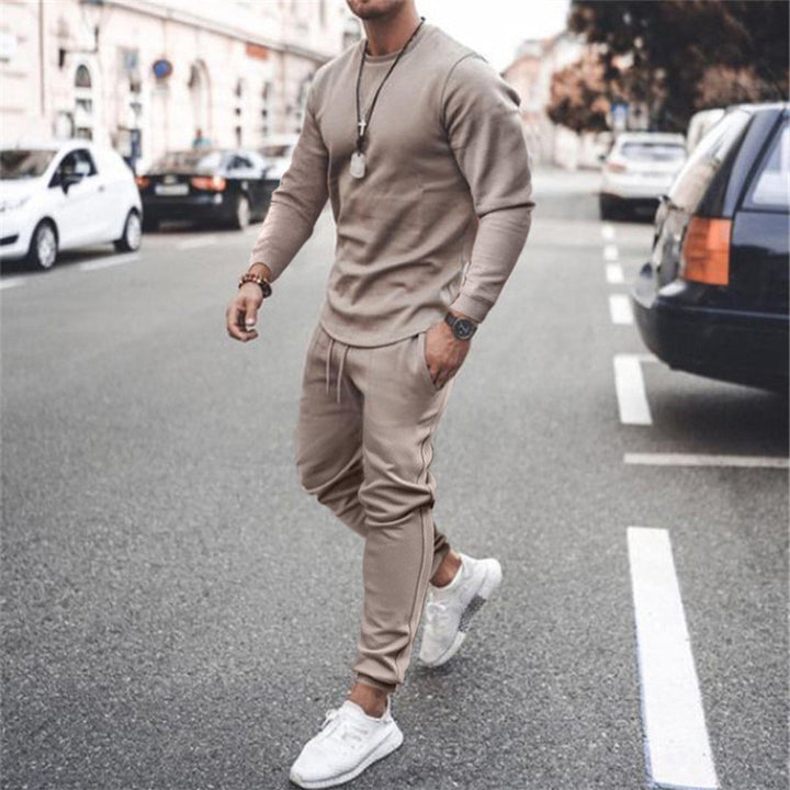 Back view of men's slim fit tracksuit, showcasing comfortable and athletic design for jogging & sportswear.