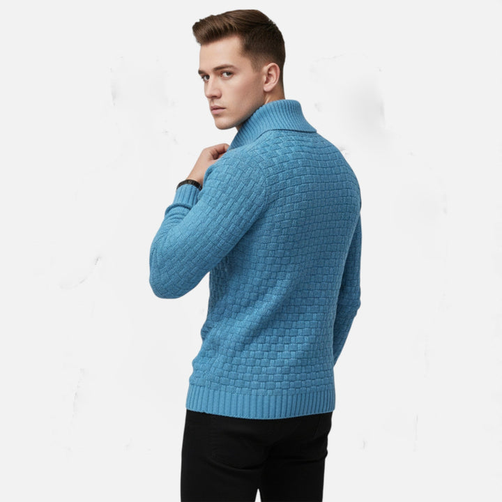 Man wearing a stylish men's slim fit turtleneck sweater with button accents.