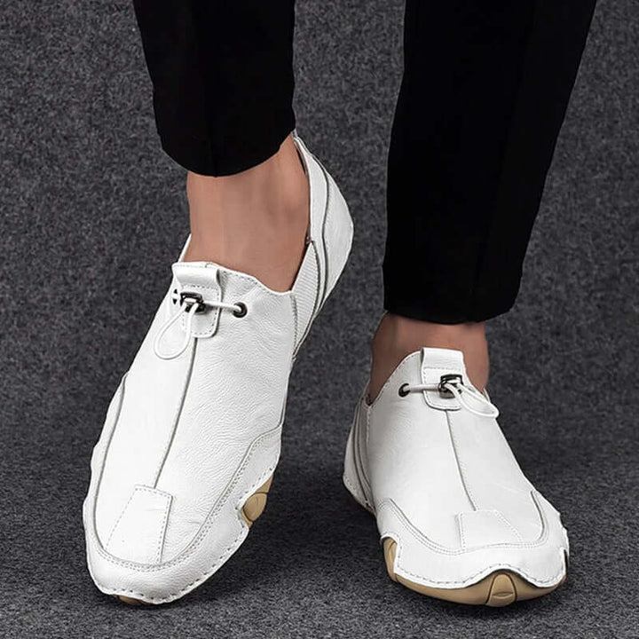 Men's slip-on driving loafers in black, comfortable casual footwear for everyday wear, versatile style.