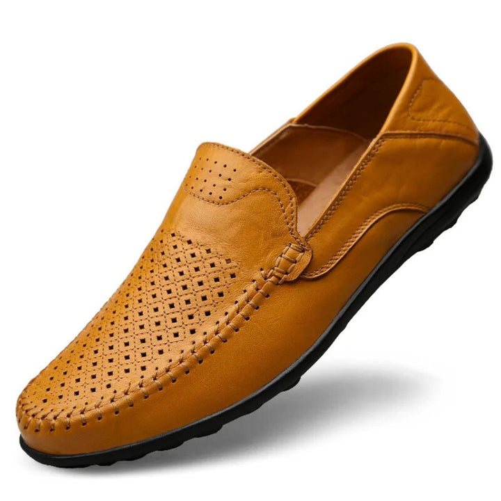 Brown men's perforated slip-on loafers with stitched details. Ideal comfortable smart casual shoes for everyday wear.