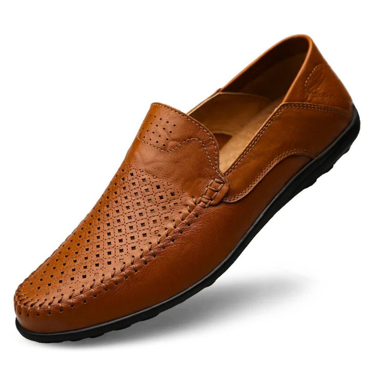 Black men's perforated slip-on loafers. Stylish & comfortable casual shoes, great for smart casual or summer outfits.