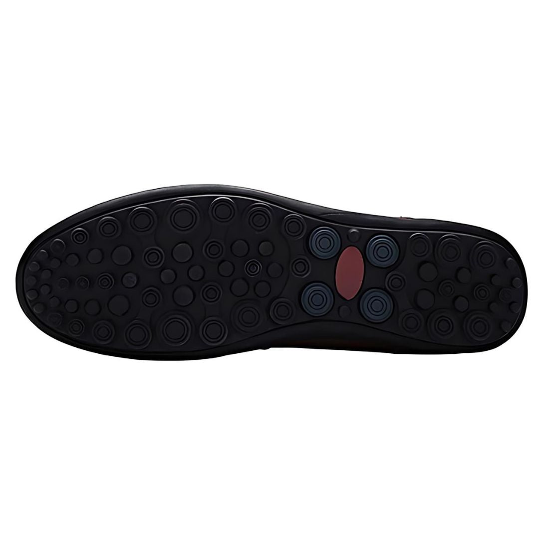 Close-up of men's perforated slip-on loafers showing stitched panel design. Stylish & comfortable casual summer shoes.