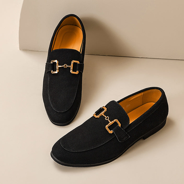 Side profile of men's dress loafers with easy slip-on design and metal detail