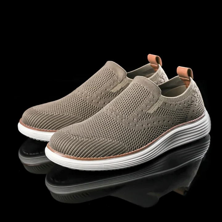 Men's slip-on summer trainers, lightweight & breathable, perfect for casual wear & travel comfort.
