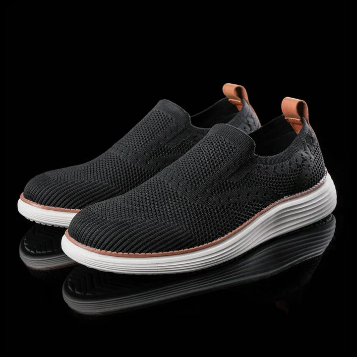 Comfortable men's slip-on trainers with breathable design for summer. Ideal lightweight casual travel shoes.