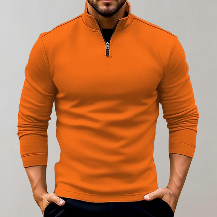 Versatile men's half-zip pullover. Fitted long sleeve knit jumper in a smart casual style, essential for winter fashion.