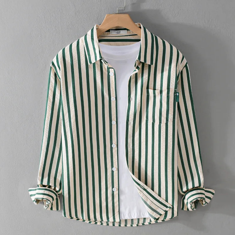 Stylish men's striped collared shirt with long sleeves and button front. Ideal for casual outings & smart everyday look.