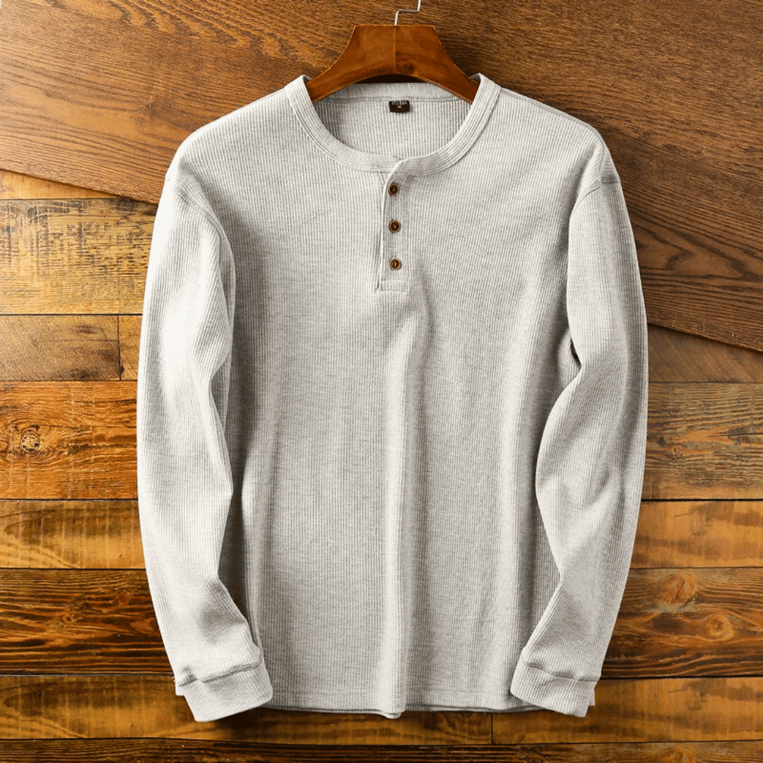 Men's soft long sleeve Henley shirt for casual everyday wear. Comfortable button-neck top.