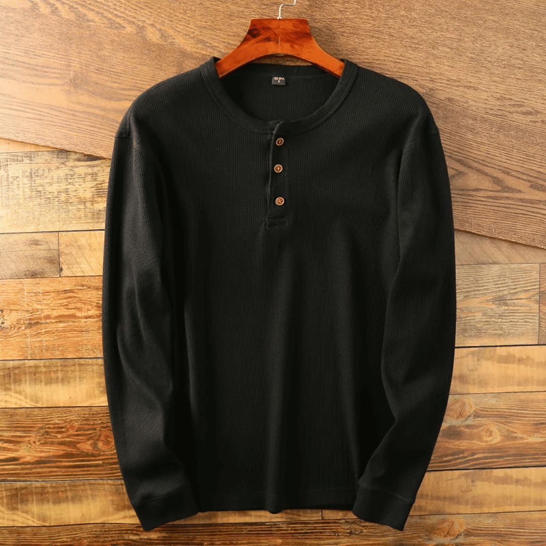 Relaxed fit men's long sleeve Henley shirt, a soft and comfortable staple for casual outfits.