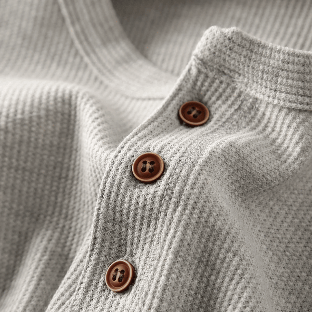 Men's casual long sleeve shirt, a soft Henley design with a buttoned placket. Essential comfortable top.