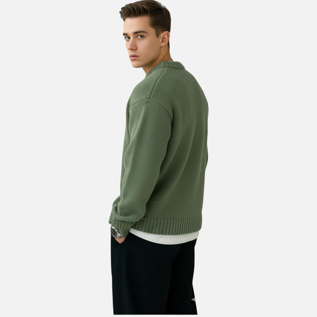 Cozy men's pullover sweater in a solid color, a versatile winter wardrobe staple.