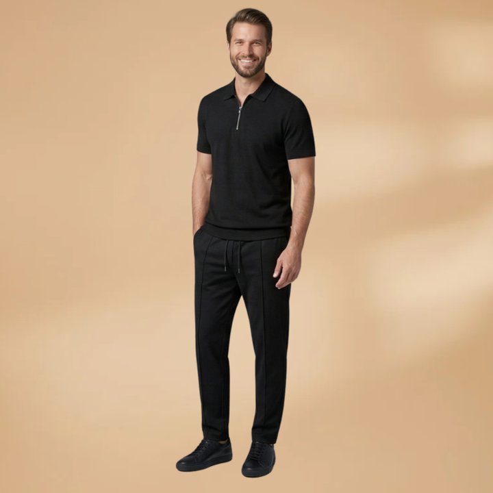 Dynamic shot of a man in a men's tracksuit with modern sporty fit.