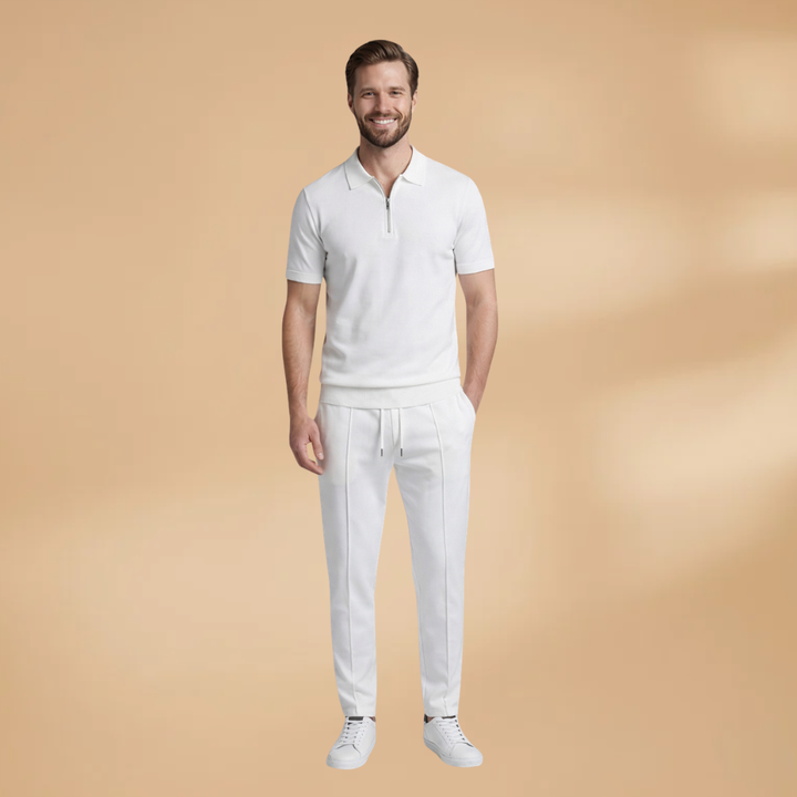 Detail of the drawstring waist and ankle cuffs on men's jogging trousers.
