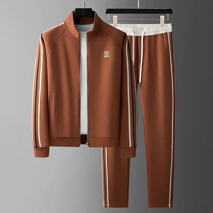 Dark grey men's sporty tracksuit, 2-piece athletic set for performance and style.