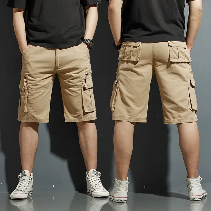 Model wearing stylish knee-length men's cargo shorts for summer