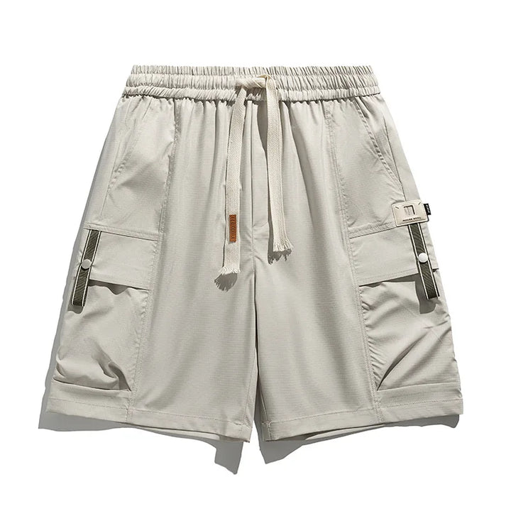 Men's spring cargo shorts with adjustable drawstring waist for a comfortable fit.