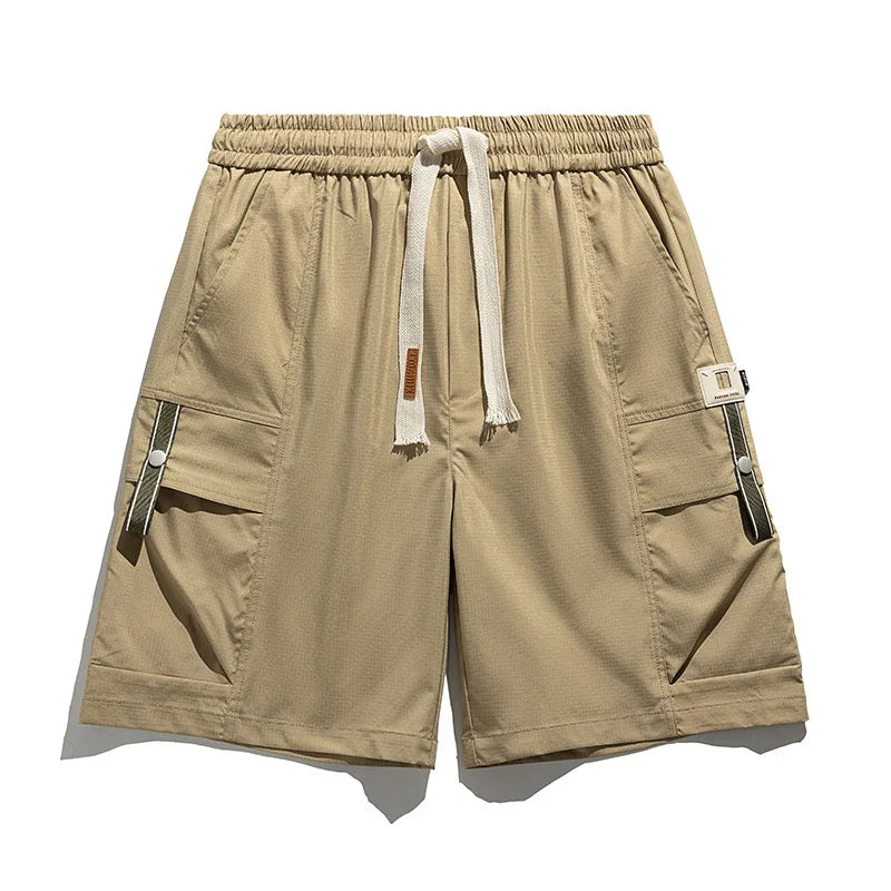 Utility-style cargo shorts for men, featuring multiple pockets and a drawstring closure.