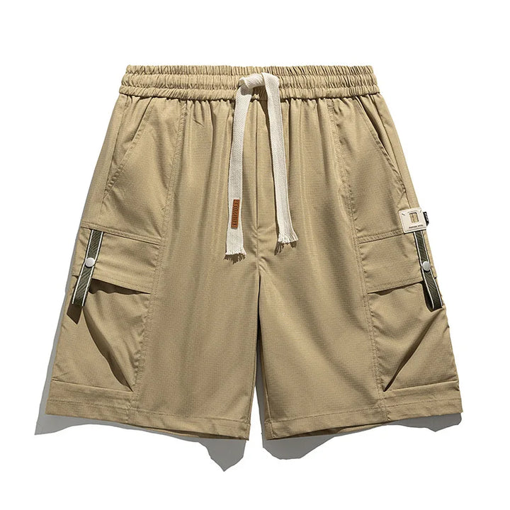 Utility-style cargo shorts for men, featuring multiple pockets and a drawstring closure.