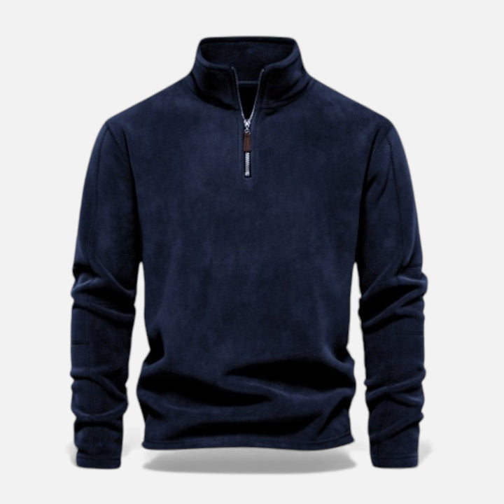 A man enjoying a cold day wearing a warm, zippered fleece sweatshirt