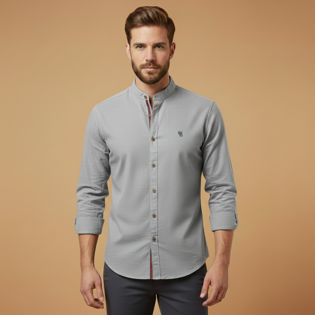 A man in a neatly ironed men's stand collar long sleeve shirt for a sharp look
