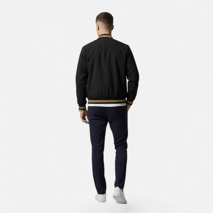 Model wearing a stylish men's fall fashion stand-collar jacket.